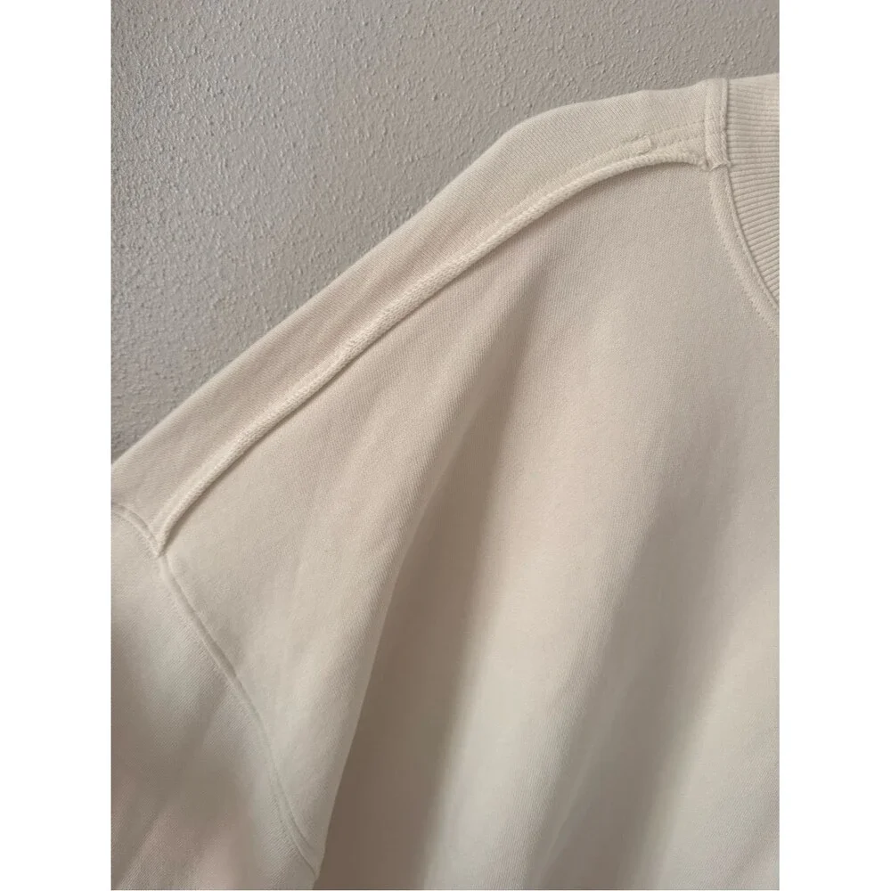 Free People Eleanor Sweatshirt dress Cream pleated skirt heart embroidery NWOT